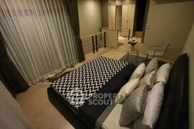 Luxurious bedroom with elegant decor and modern furnishings in a stylish apartment.