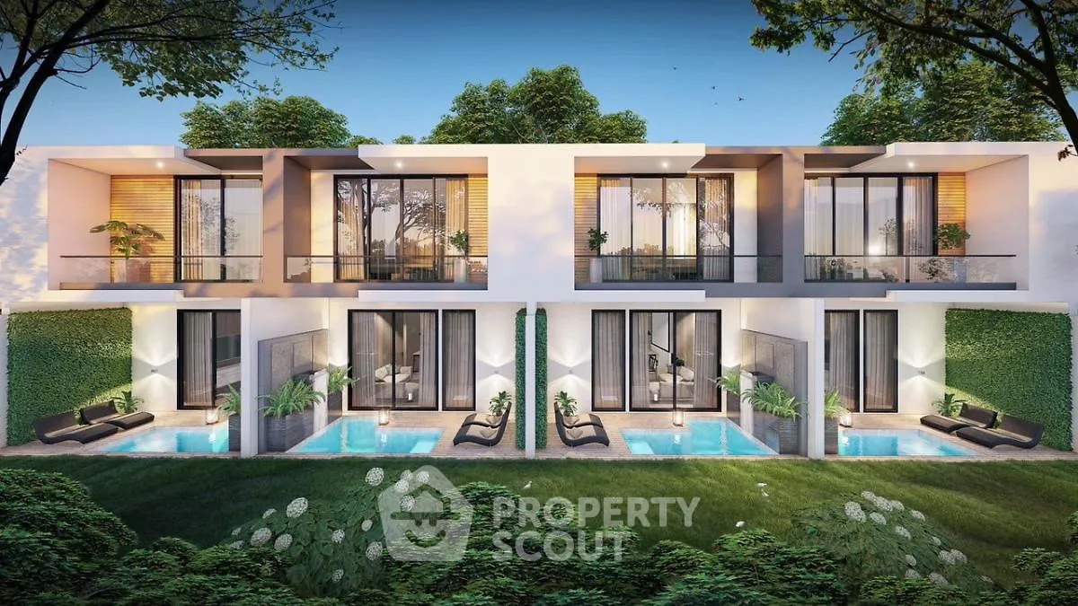 Luxurious modern duplex with private pools and lush garden view