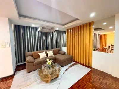 Spacious modern living room with cozy sofa and stylish decor