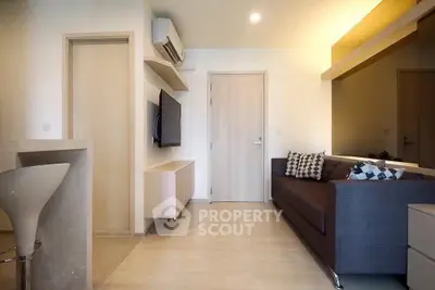 Modern living room with sleek design and cozy ambiance