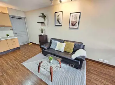 Modern living room with stylish decor and open kitchen layout
