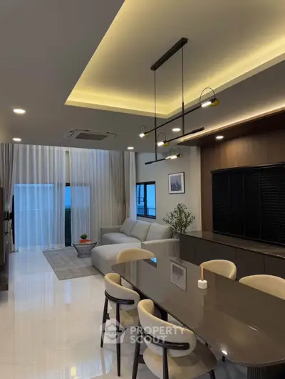 Elegant modern living room with stylish dining area and ambient lighting