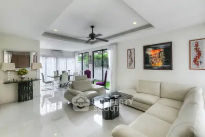 Spacious modern living room with elegant decor and garden view