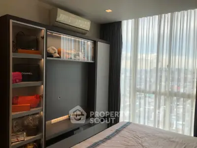 Luxurious bedroom with city view and elegant built-in storage
