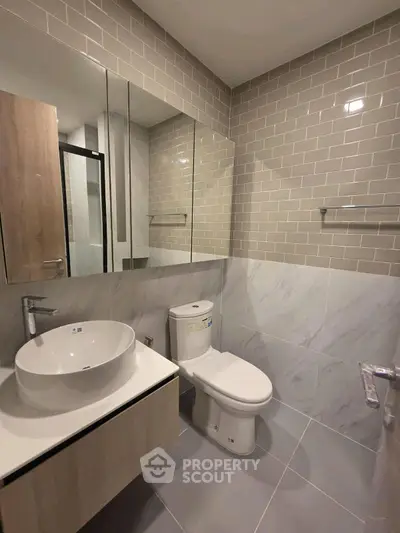 Modern bathroom with sleek fixtures and stylish tile design