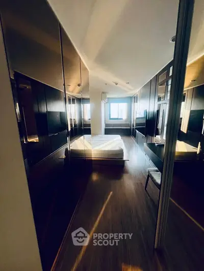 Luxurious bedroom with modern design and ample natural light