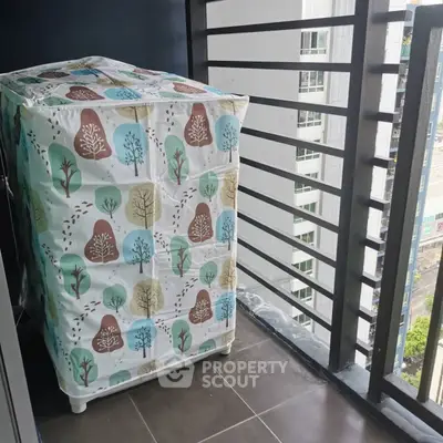 Modern balcony with washing machine and city view, perfect for urban living convenience.