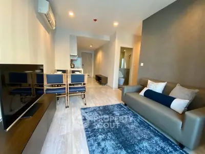 Modern living room with stylish decor and open layout in a contemporary apartment.