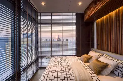 Luxurious bedroom with panoramic city view and modern decor