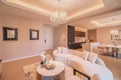 Luxurious open-plan living room with elegant lighting and modern decor
