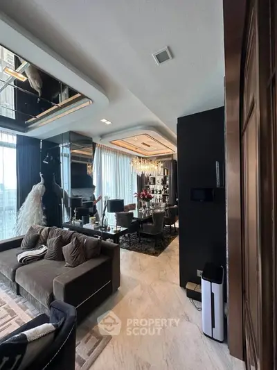 Luxurious living room with elegant decor and modern furnishings in a high-end apartment.