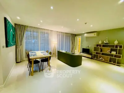 Spacious modern living room with elegant decor and ample natural light