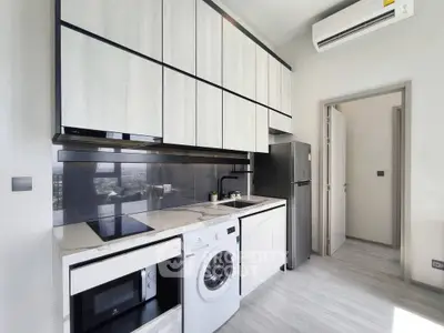 Modern kitchen with sleek cabinetry, integrated appliances, and stylish design.