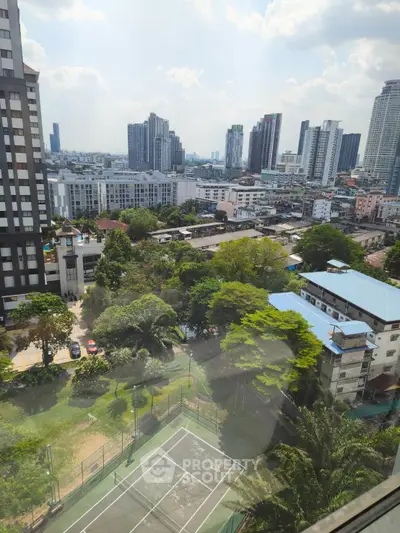 Stunning urban skyline view with lush greenery and modern architecture, perfect for city living enthusiasts.