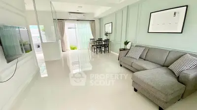 Spacious modern living room with elegant decor and ample natural light