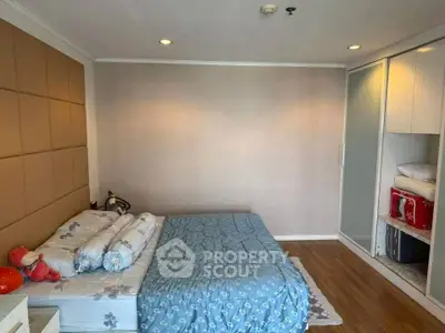 Cozy bedroom with modern design and ample storage space
