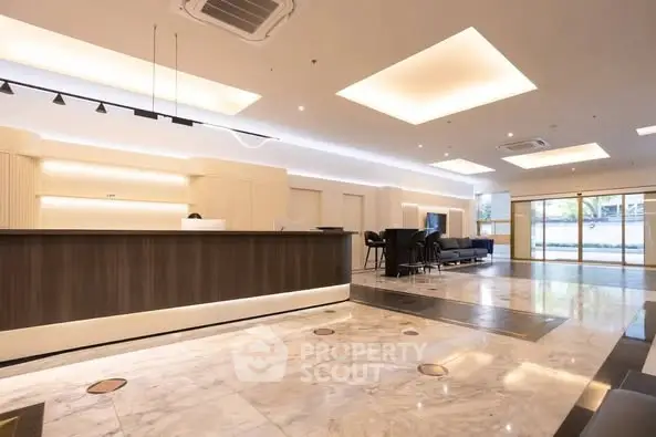 Luxurious modern lobby with elegant marble flooring and stylish lighting