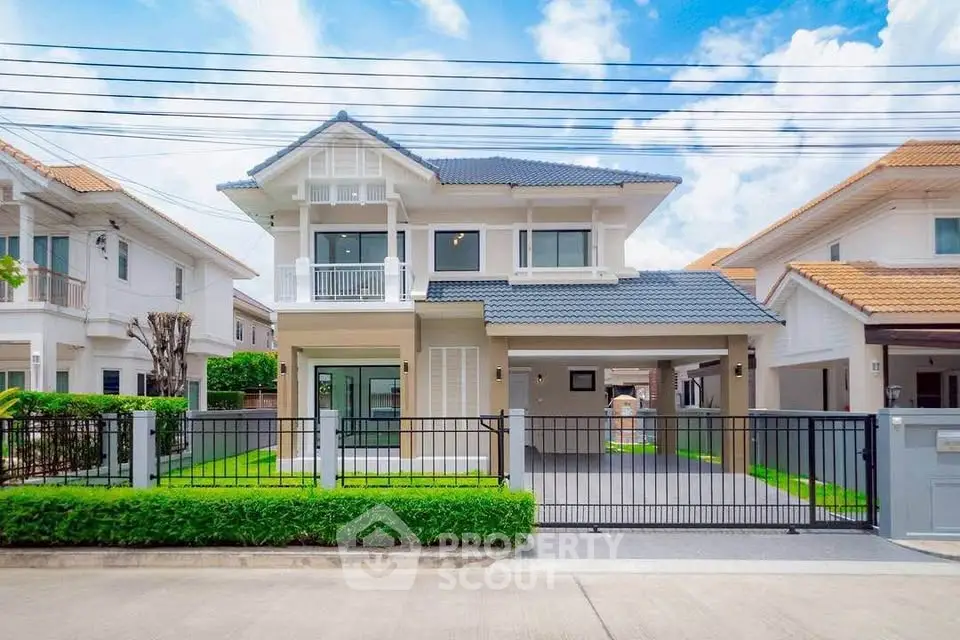 Stunning modern two-story house with spacious driveway and manicured lawn in a serene neighborhood.