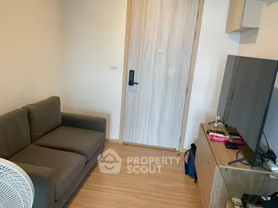 Cozy living room with modern decor and wooden flooring