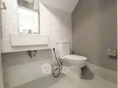 Modern bathroom with stylish tiles and sleek fixtures