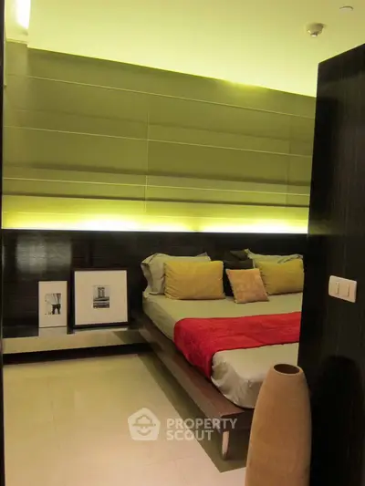 Luxurious modern bedroom with ambient lighting and stylish decor