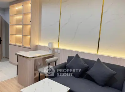 Modern living room with elegant lighting and stylish furniture