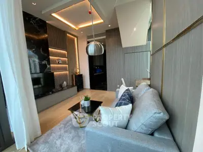 Luxurious modern living room with elegant decor and city view, featuring stylish furniture and ambient lighting.