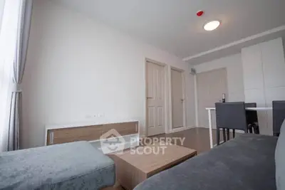 Modern living room with sleek furniture and natural light