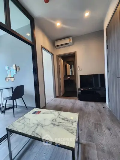 Modern living room with marble table and sleek decor