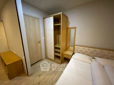 Cozy bedroom with modern wooden furniture and soft lighting