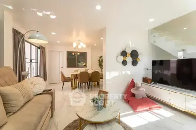 Spacious modern living room with elegant decor and ample natural light