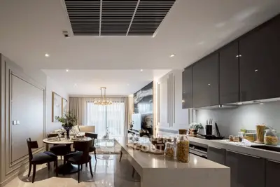 Luxurious modern kitchen with open layout and elegant dining area