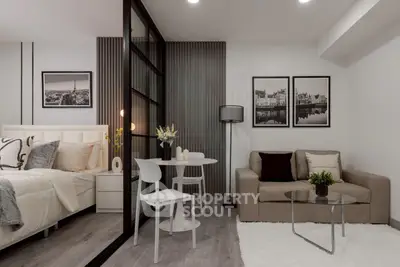 Modern studio apartment with stylish decor, featuring a cozy living area and elegant bedroom.
