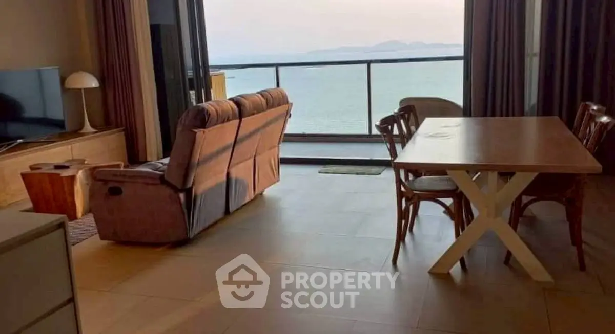 Spacious living room with ocean view and elegant furnishings