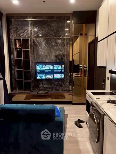 Luxurious living room with modern decor and built-in entertainment center