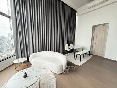 Luxurious high-rise living room with modern furniture and stunning city view