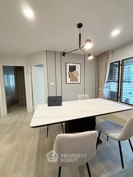 Modern dining area with stylish decor and natural light