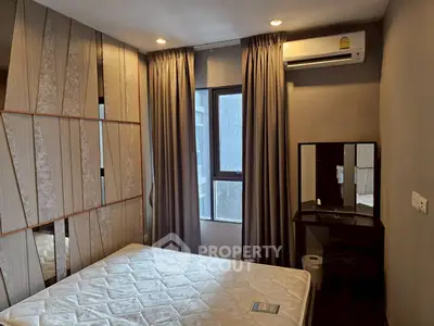 Cozy bedroom with modern decor and natural light