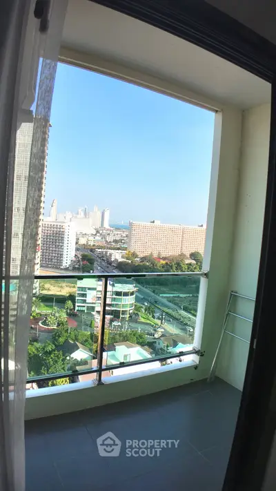 Stunning cityscape view from a high-rise balcony, perfect for urban living enthusiasts.