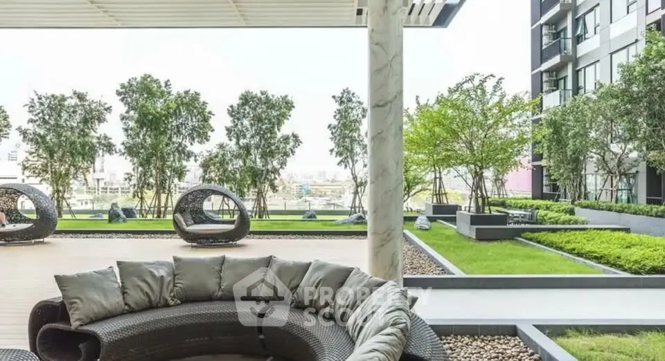 Luxurious garden terrace with modern seating and lush greenery