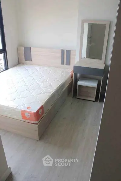 Cozy bedroom with modern furniture and natural light