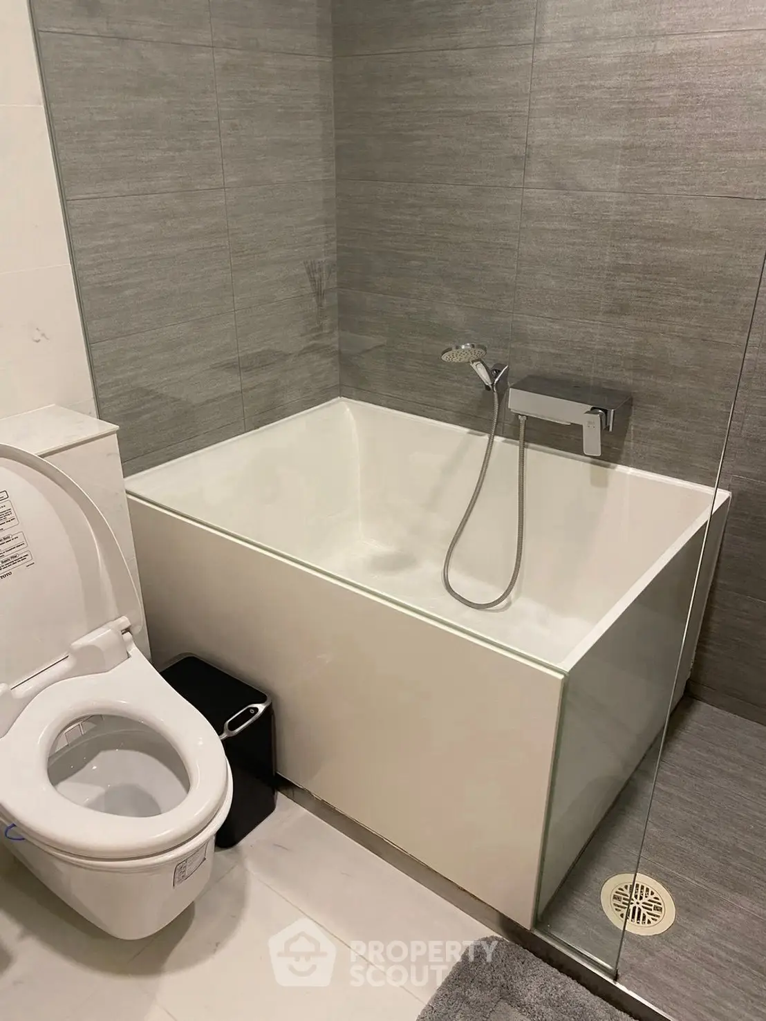 Modern bathroom with sleek bathtub and contemporary fixtures