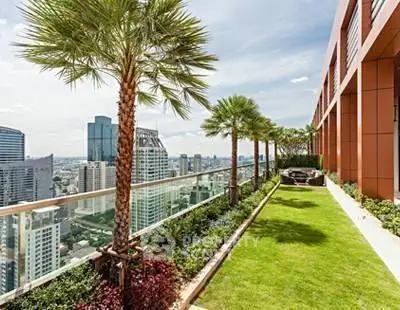 Luxurious rooftop garden with stunning city skyline views in modern high-rise building.