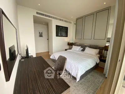 Luxurious modern bedroom with elegant decor and spacious layout