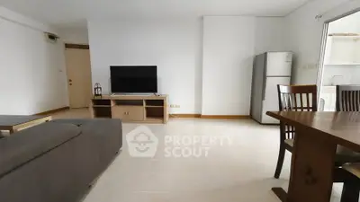 Spacious living room with modern furniture and natural light