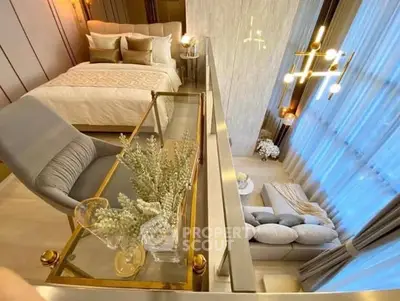 Luxurious loft bedroom with elegant decor and modern lighting, overlooking a stylish living area.
