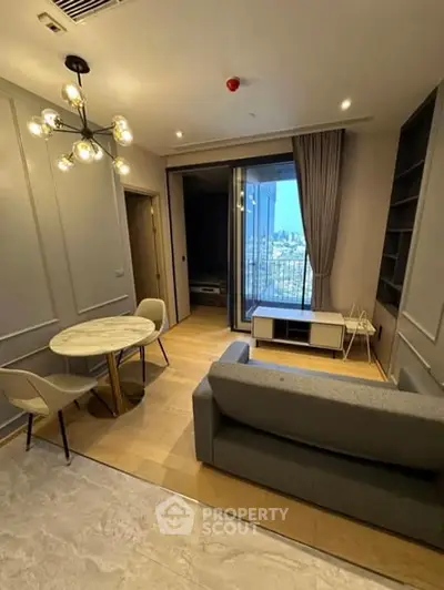 Modern living room with elegant dining area and city view balcony.