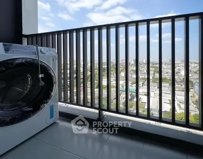 High-rise balcony with stunning city view and modern washing machine