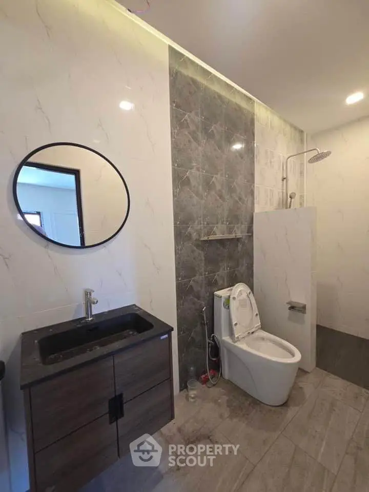 Modern bathroom with sleek fixtures and stylish tile design