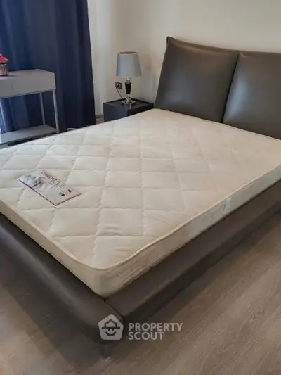 Modern bedroom with stylish bed and elegant decor